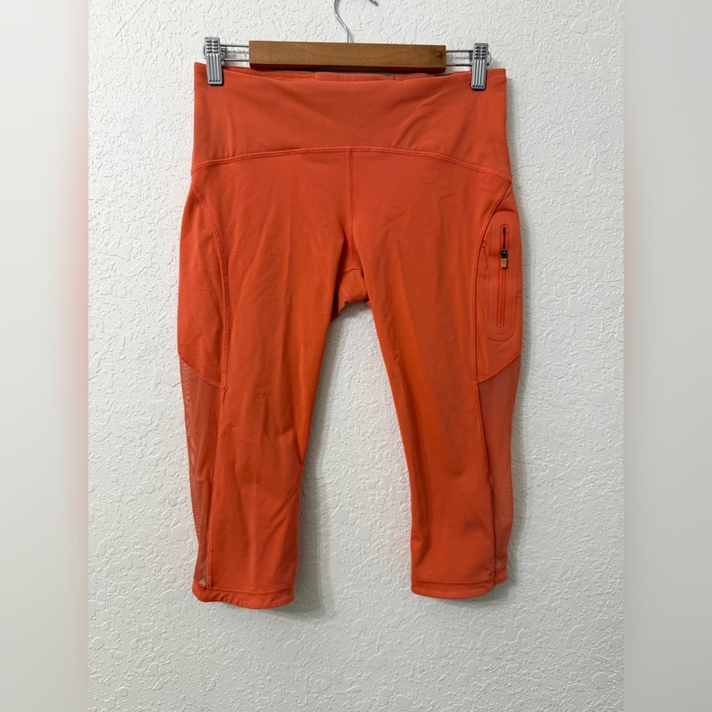 Lululemon Cropped Pocket Athletic Leggings in Orange - 8